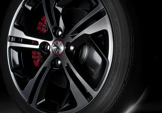 The GTi has red-acceneted wheels