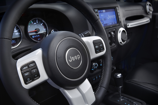 The interior gets heated seats, a leather steering wheel and infotainment system