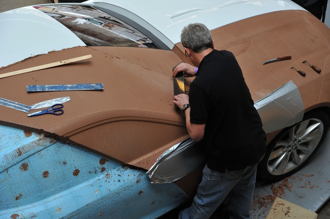 Jaguar has master artisans who sculpt the clay