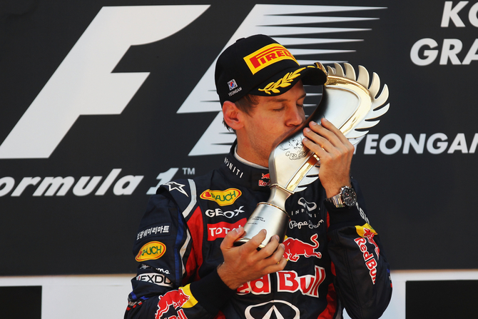 Vettel retunrs to wins and hands title to Red Bull