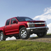 Chevrolet Colorado 2LT vs Chrysler Town & Country New LX vs GMC Sierra 1500 Regular Cab 2WD Work Truck Long Box vs Ford Mustang V6 Premium Coupé