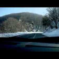 Lamborghini Aventador LP700 driving through snow.